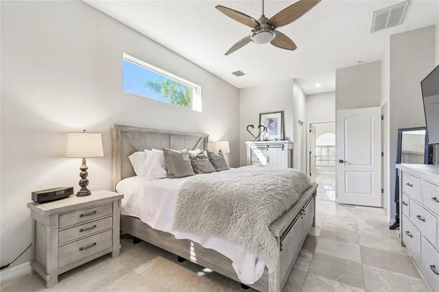 a view of a swimming pool with a yard and lake view