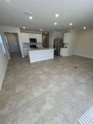 a view of hallway with hallway and closet