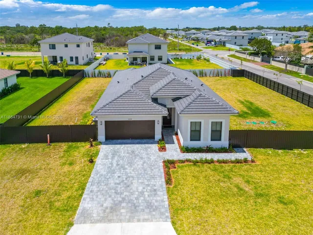 a view of a house with a swimming pool