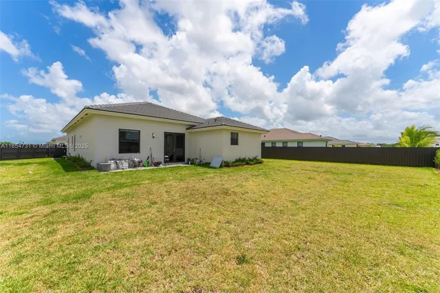 a front view of house with yard
