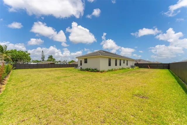 a view of a house with a swimming pool