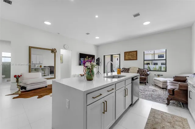 a view of a living room and dining room