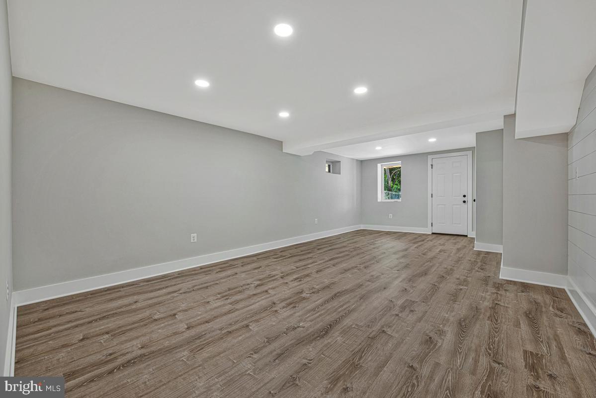 2105 Queens Chapel Road Mount Rainier, MD 20712 - Photo 24 of 33 a view of an empty room with wooden floor