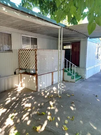 a view of a porch with furniture and floor