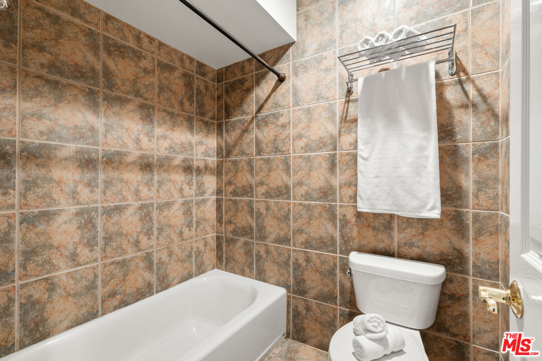 8640 Gulana Avenue, Unit K3017 Playa del Rey, CA 90293 - Photo 12 of 19 a bathroom with a toilet and shower