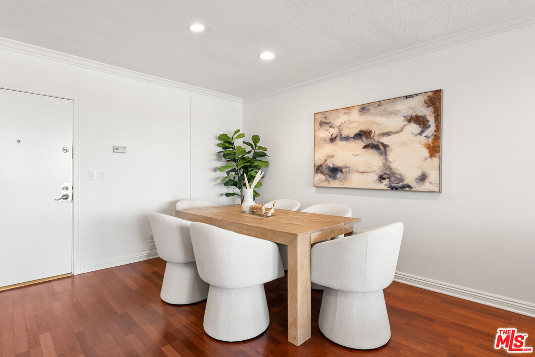 8640 Gulana Avenue, Unit K3017 Playa del Rey, CA 90293 - Photo 4 of 19 a dining room with furniture and wooden floor