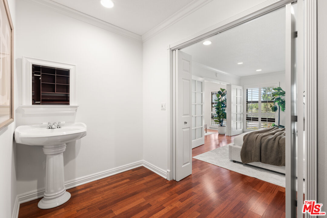 8640 Gulana Avenue, Unit K3017 Playa del Rey, CA 90293 - Photo 10 of 19 a bathroom with a sink a mirror and a shower