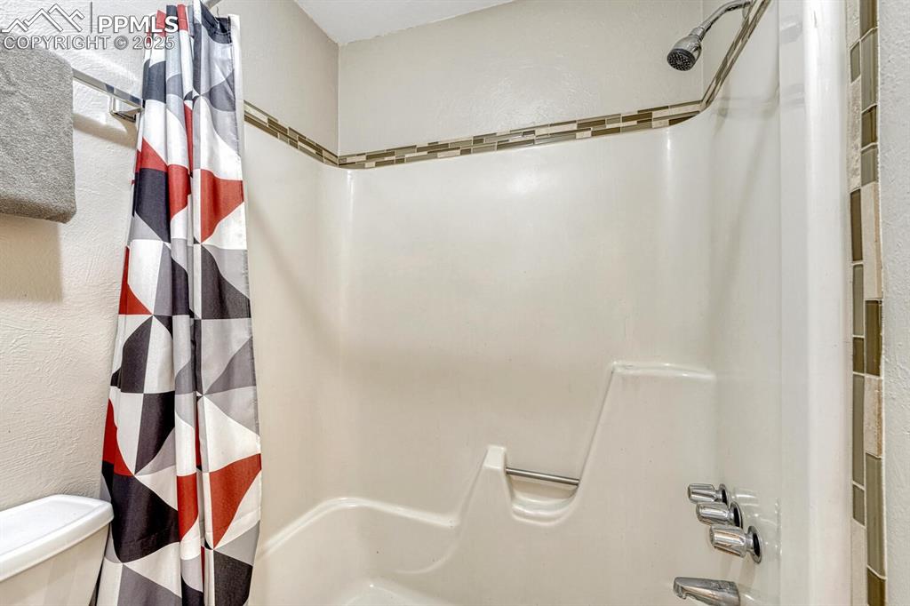1661 Deer Creek Road Monument, CO 80132 - Photo 22 of 48 Full bath on main