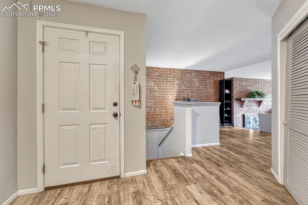 1661 Deer Creek Road Monument, CO 80132 - Photo 4 of 48 Entry into home with LVP flooring
