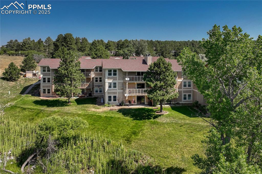 1661 Deer Creek Road Monument, CO 80132 - Photo 45 of 48 rear view of condo