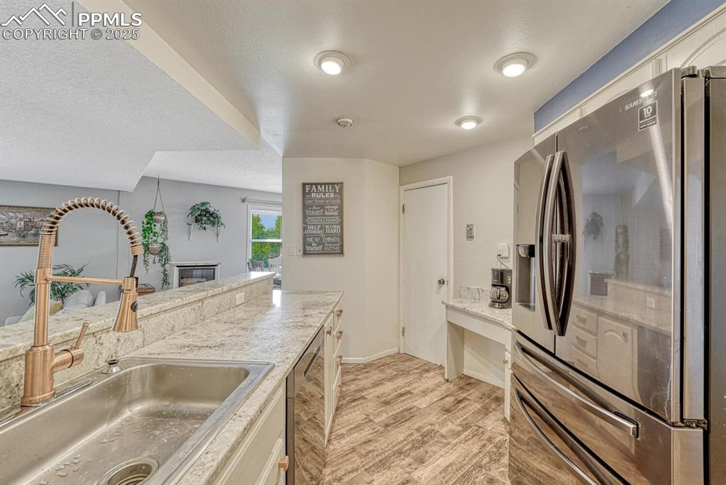 1661 Deer Creek Road Monument, CO 80132 - Photo 5 of 48 Kitchen with large walk in pantry