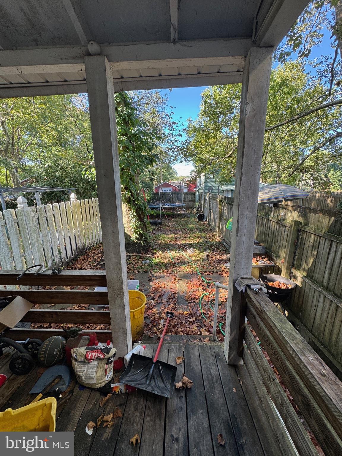 209 Willow Street Delanco, NJ 08075 - Photo 7 of 14 a view of a patio with wooden floor and outdoor seating