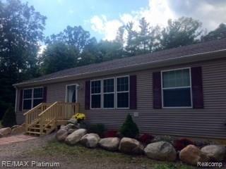 6659 Munsell Road Howell, MI 48843 - Photo 1 of 16 munsell front.jpg