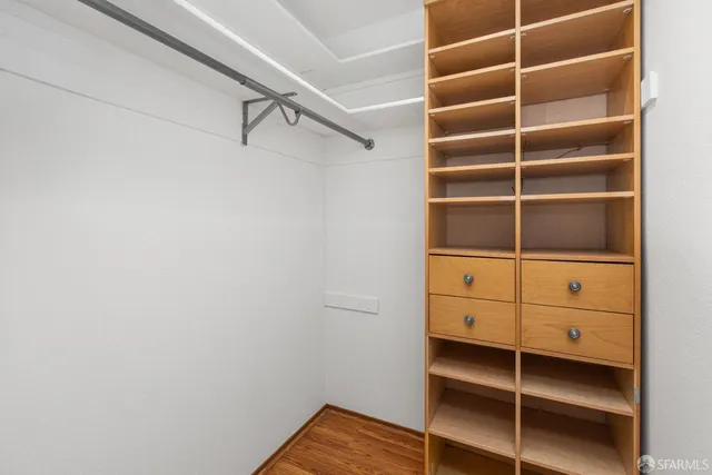 a view of a chair and table in the patio