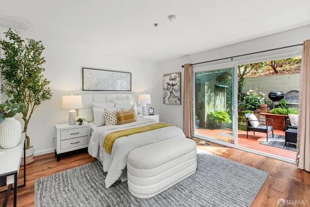 a white toilet sitting next to a bathroom sink