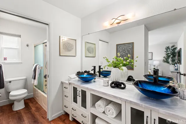 a view of a backyard with sitting area