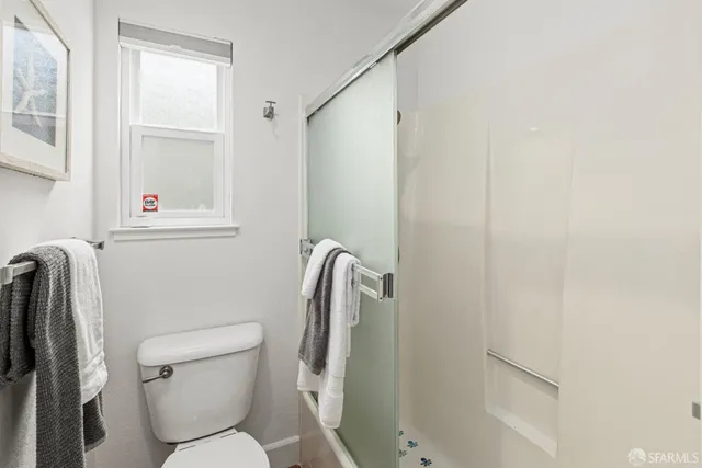 an outdoor sitting area with furniture