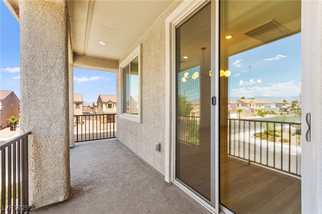 5606 Spring Trellis Street Las Vegas, NV 89113 - Photo 23 of 44 Balcony featuring a residential view