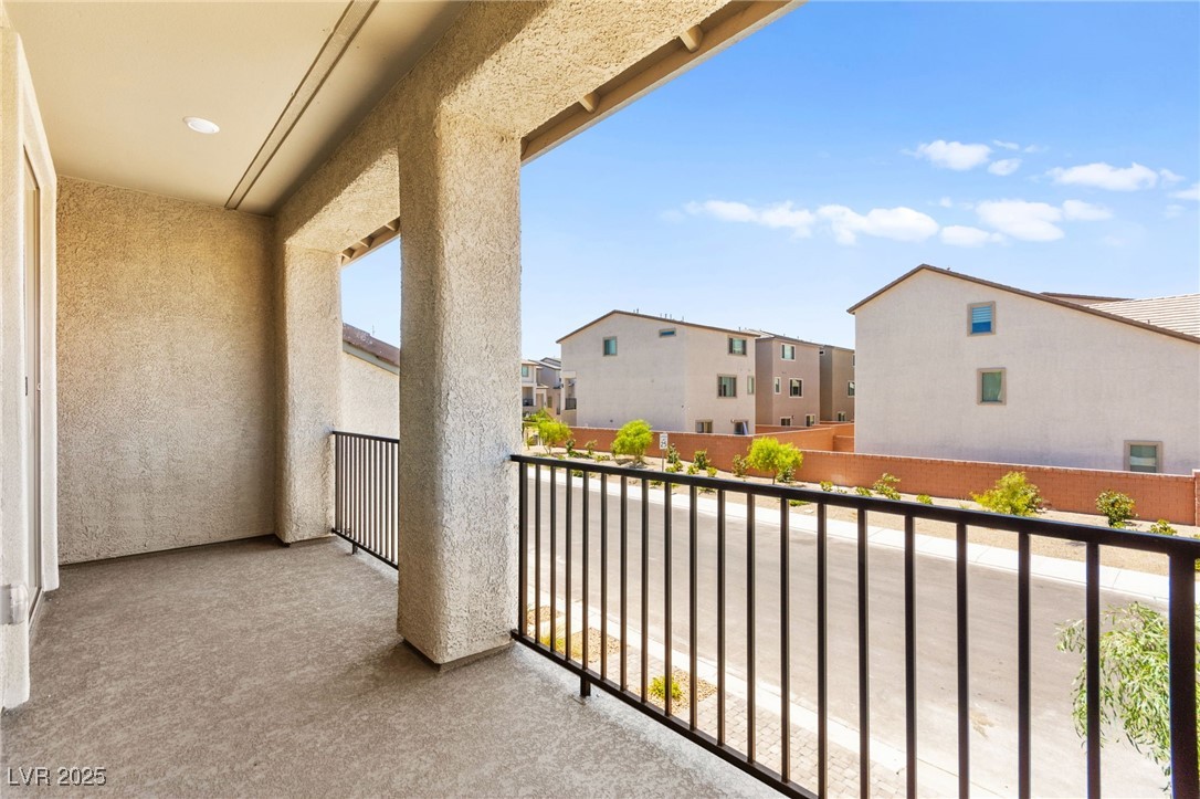5606 Spring Trellis Street Las Vegas, NV 89113 - Photo 30 of 44 Balcony with a residential view