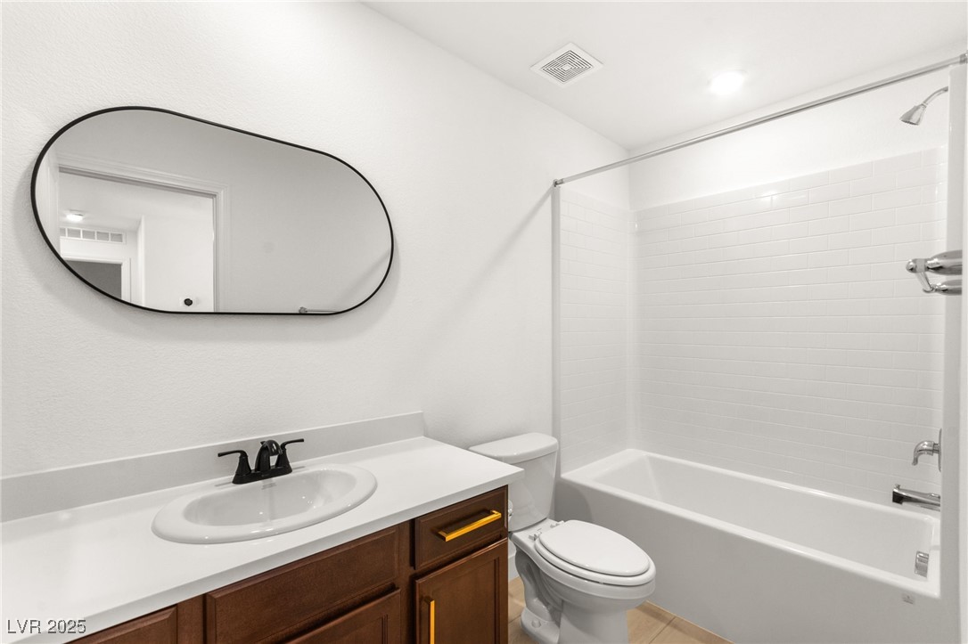 5606 Spring Trellis Street Las Vegas, NV 89113 - Photo 33 of 44 Full bath with vanity and tub / shower combination