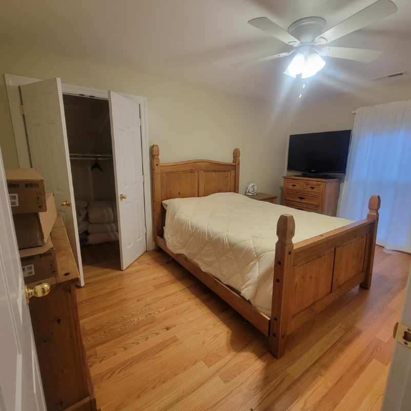 828 Prosser Road Leoma, TN 38468 - Photo 12 of 20 a bedroom with a bed and a flat screen tv