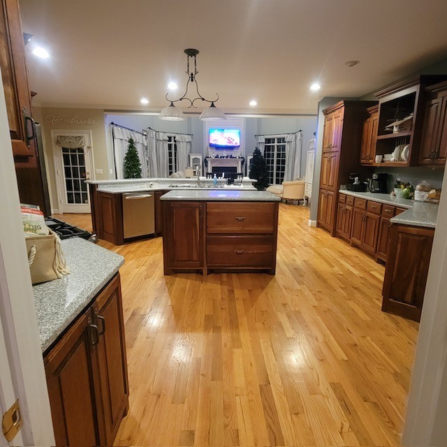 828 Prosser Road Leoma, TN 38468 - Photo 4 of 20 a kitchen with stainless steel appliances granite countertop a sink a stove top oven a counter space and cabinets