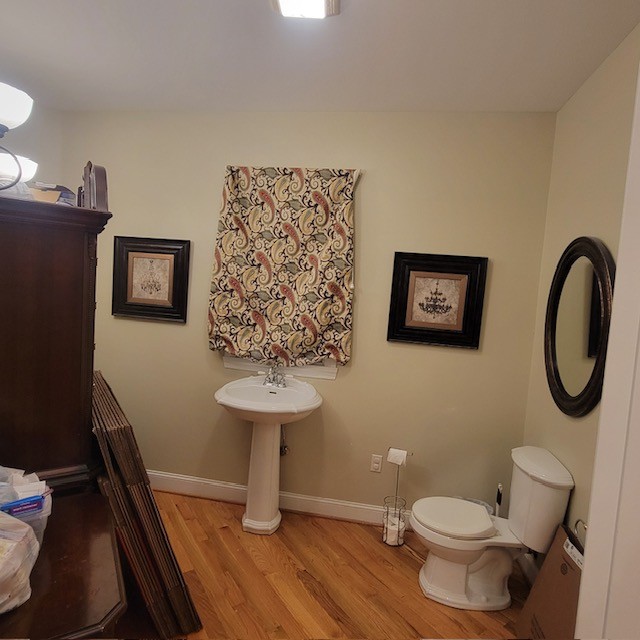 828 Prosser Road Leoma, TN 38468 - Photo 5 of 20 a bathroom with a toilet sink and mirror