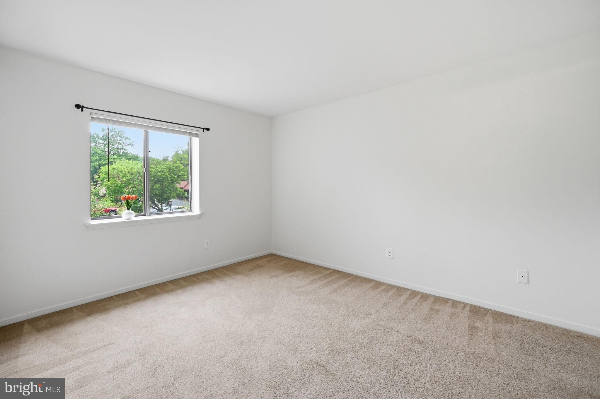 1659 Parkcrest Circle, Unit C Reston, VA 20190 - Photo 24 of 31 an empty room with windows