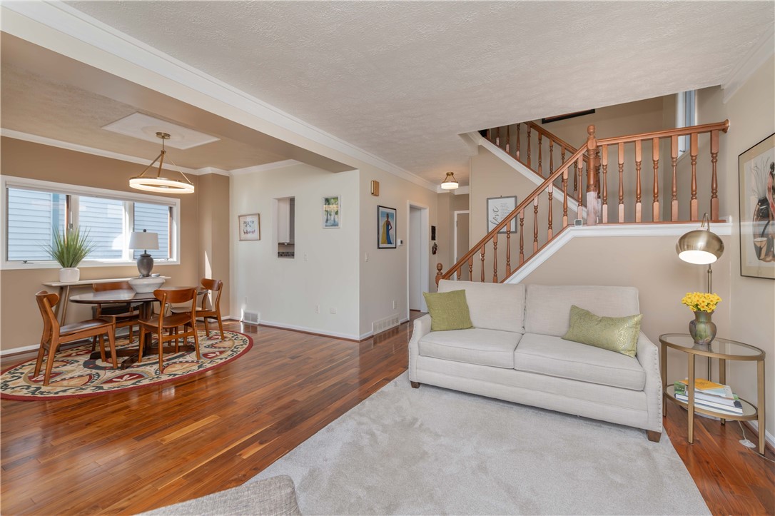 215 South Fitzhugh Street Rochester, NY 14608 - Photo 6 of 39 Living room open to Dining room
