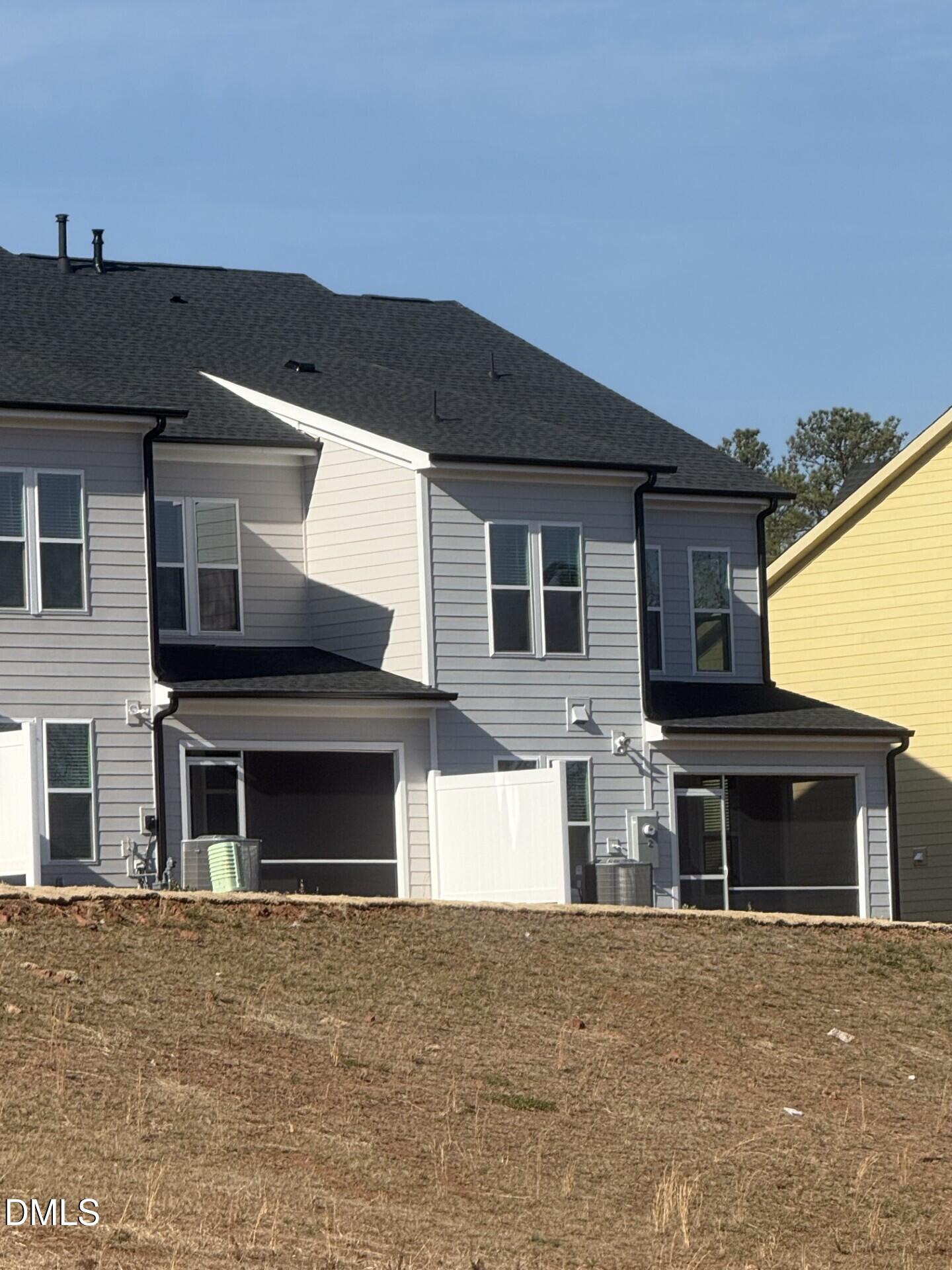 1106 Bell Heather Road Durham, NC 27703 - Photo 2 of 3 a front view of a house with a yard