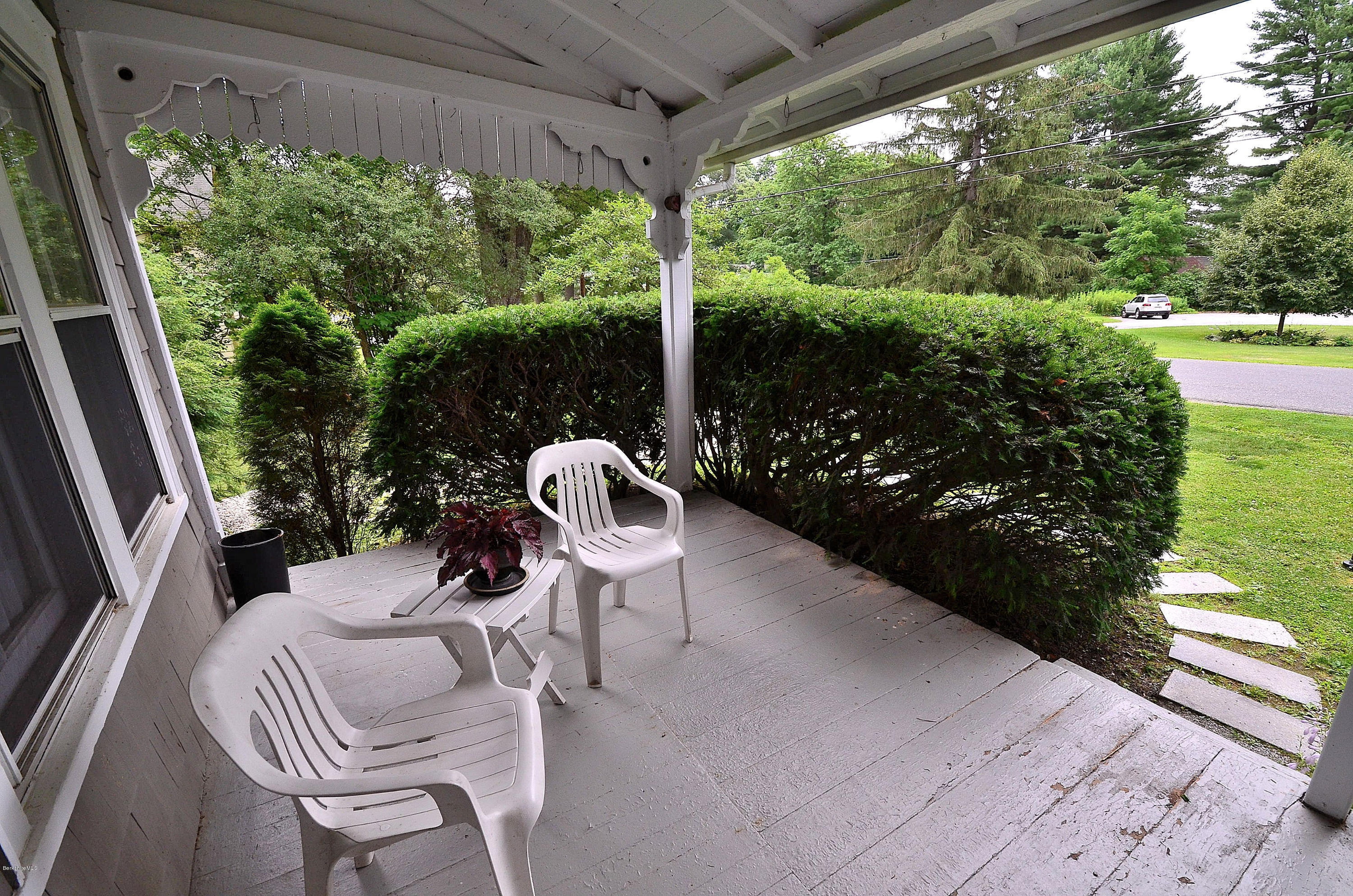 4 Cherry Hill Road Stockbridge, MA 01262 - Photo 2 of 19 a view of balcony with a patio and garden