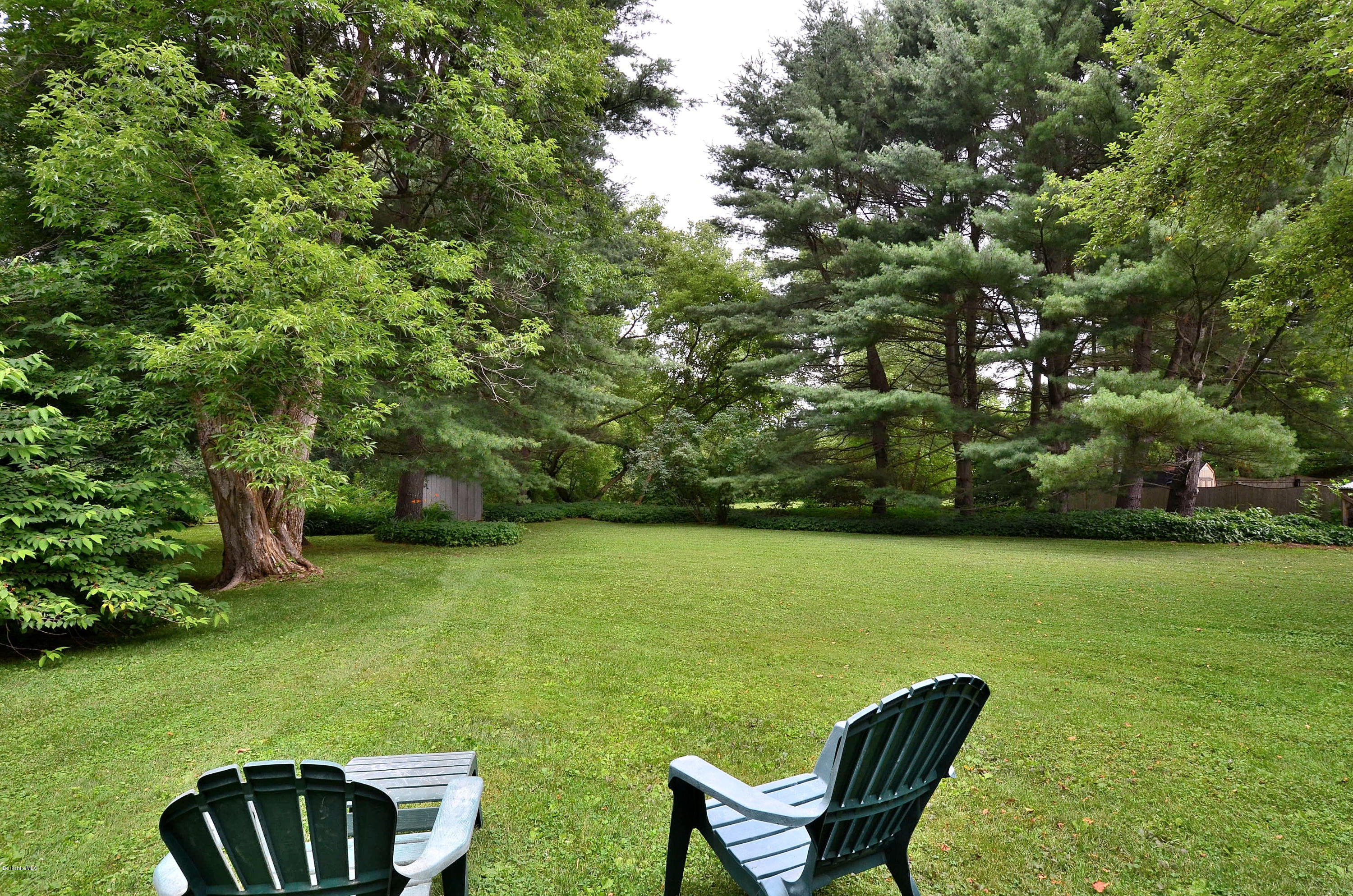 4 Cherry Hill Road Stockbridge, MA 01262 - Photo 19 of 19 a view of a chair and table in the garden