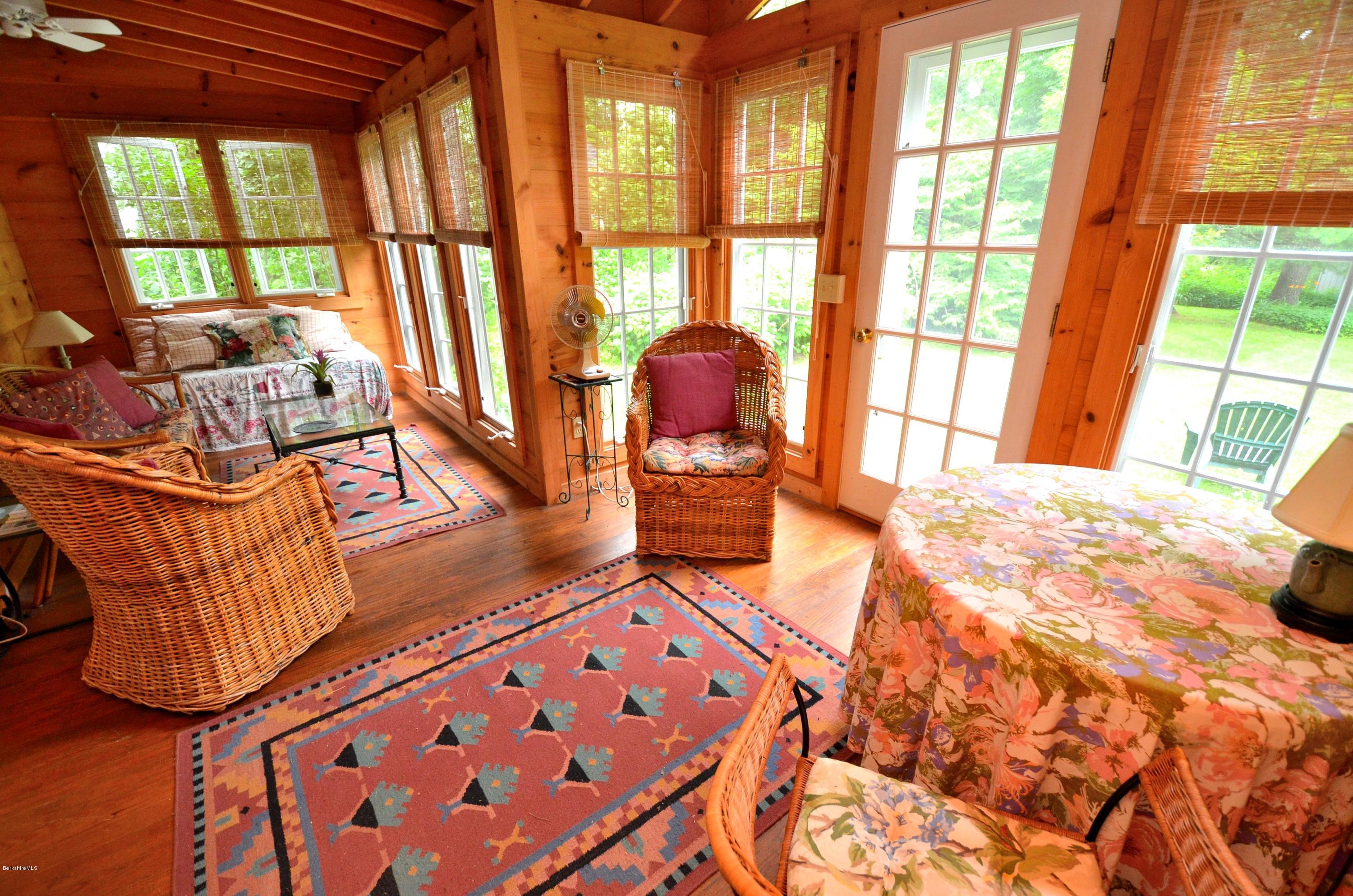 4 Cherry Hill Road Stockbridge, MA 01262 - Photo 6 of 19 a bedroom with furniture and a large window