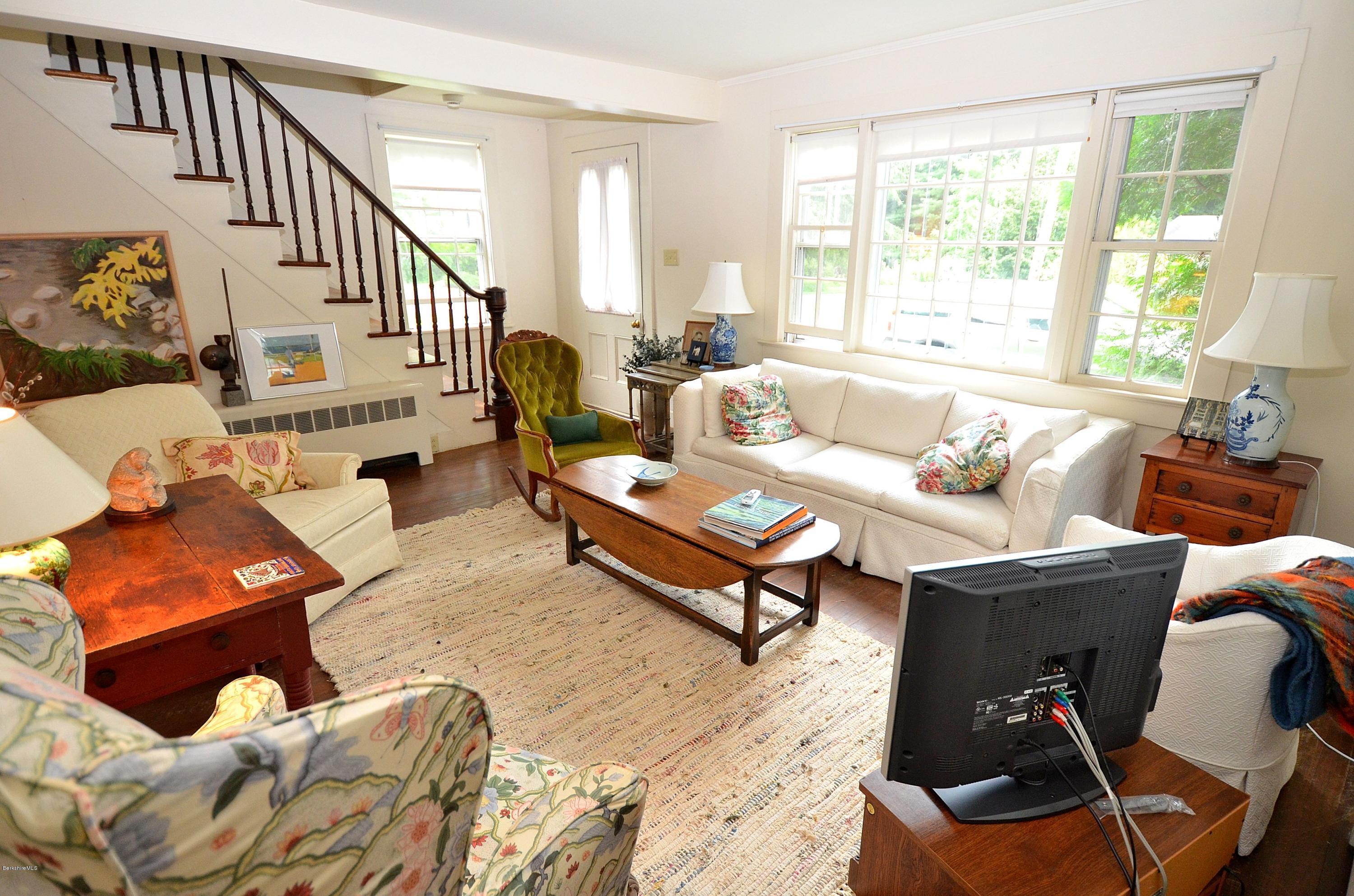 4 Cherry Hill Road Stockbridge, MA 01262 - Photo 7 of 19 a living room with furniture and a window