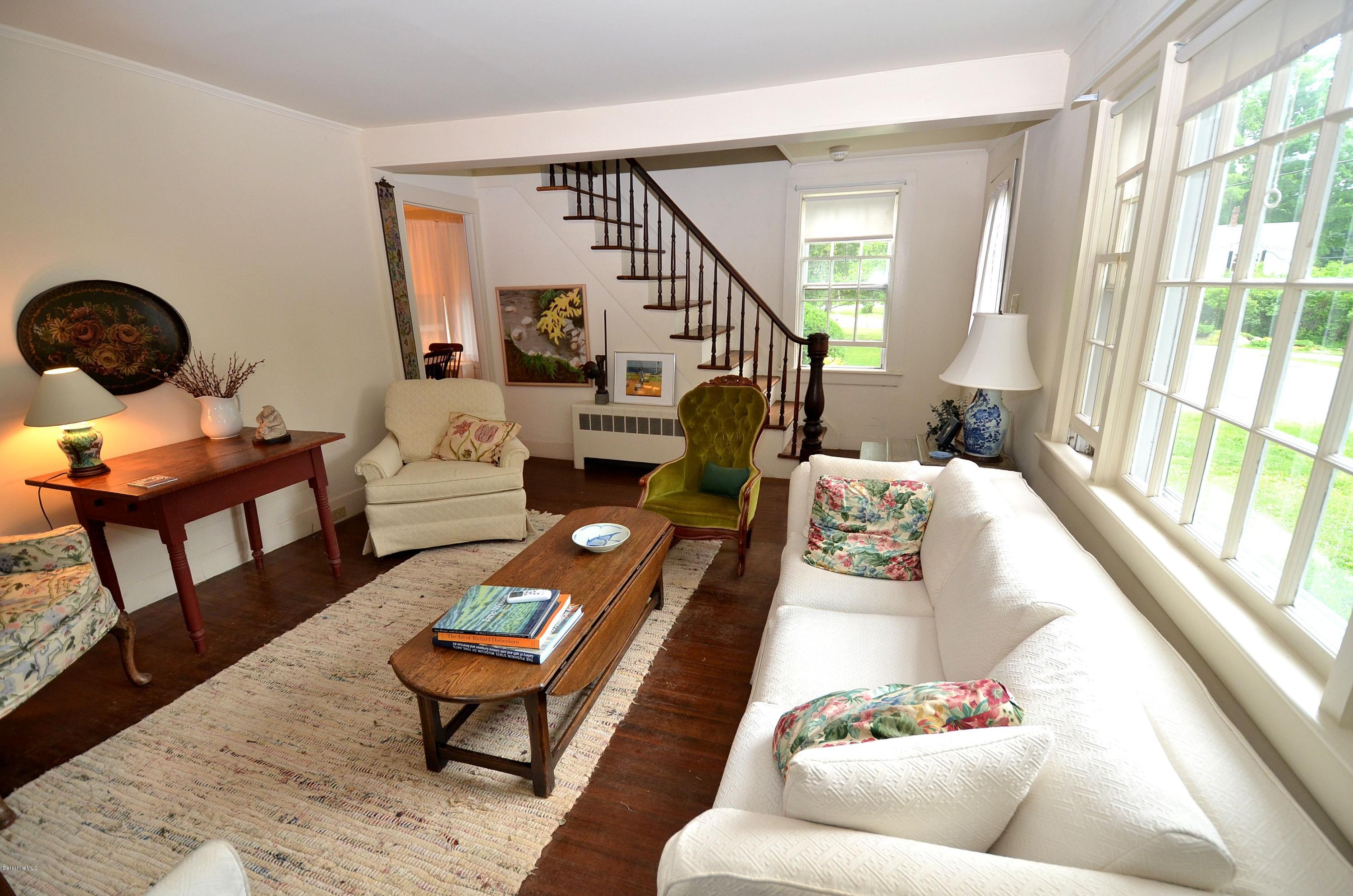 4 Cherry Hill Road Stockbridge, MA 01262 - Photo 8 of 19 a living room with furniture and a large window