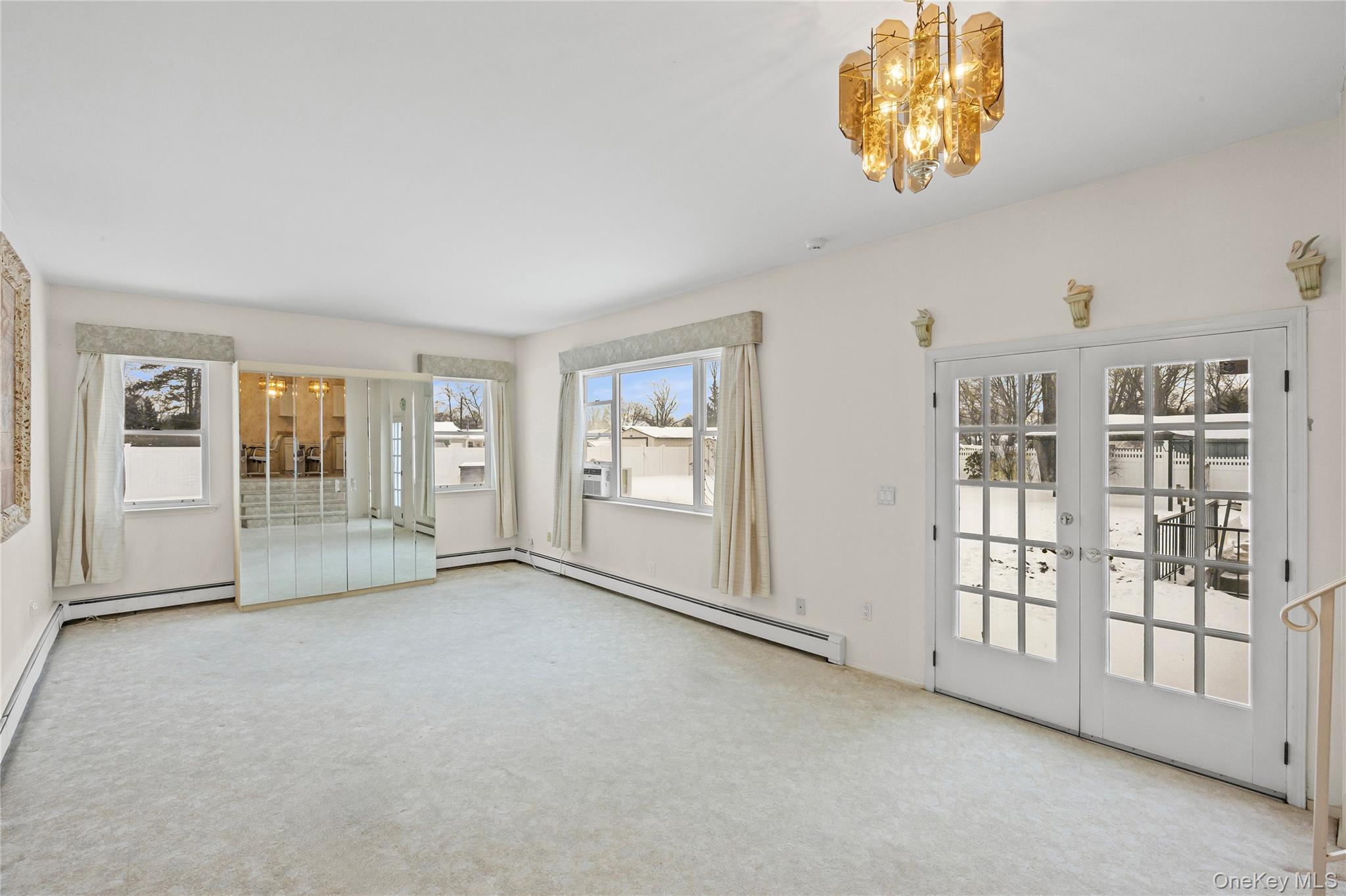 3 Brenner Road Coram, NY 11727 - Photo 15 of 41 an empty room with windows