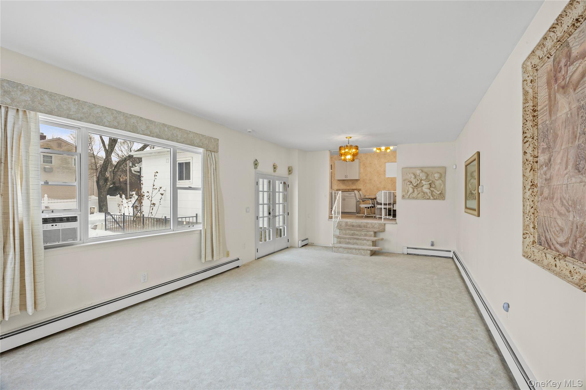 3 Brenner Road Coram, NY 11727 - Photo 16 of 41 an empty room with windows and mountain view