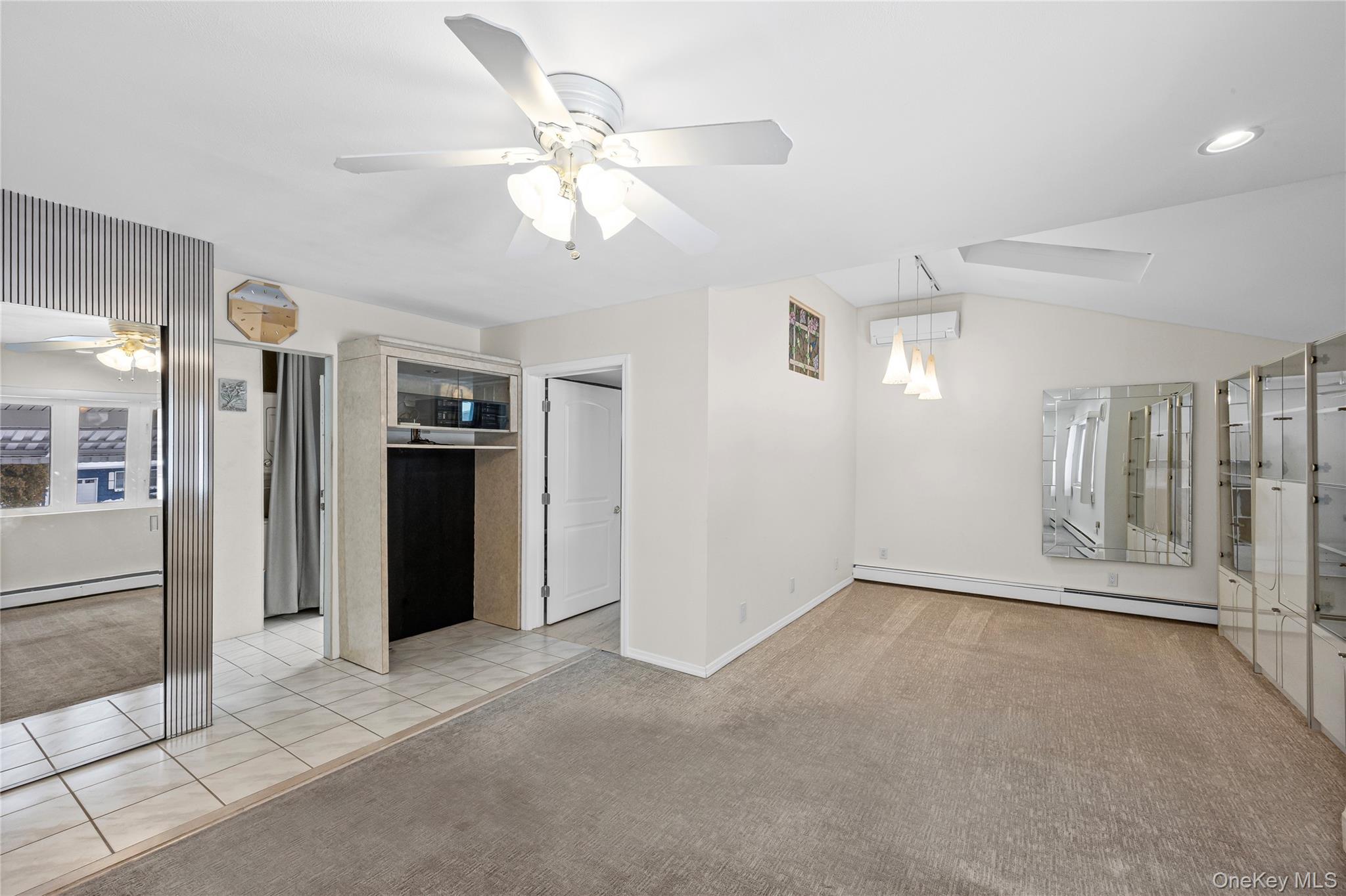 3 Brenner Road Coram, NY 11727 - Photo 17 of 41 a view of an empty room with a fireplace