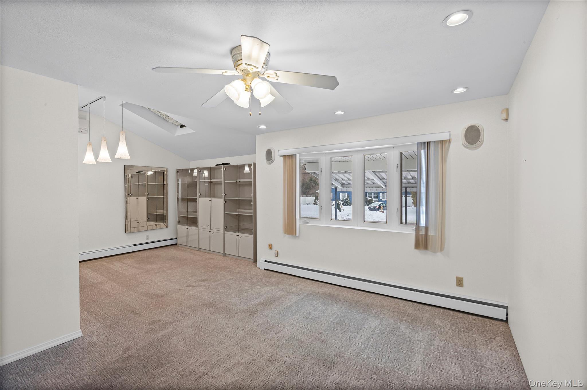 3 Brenner Road Coram, NY 11727 - Photo 18 of 41 a view of an empty room with a window
