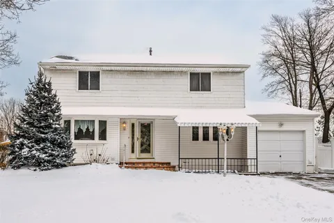 a view of a house with a garage