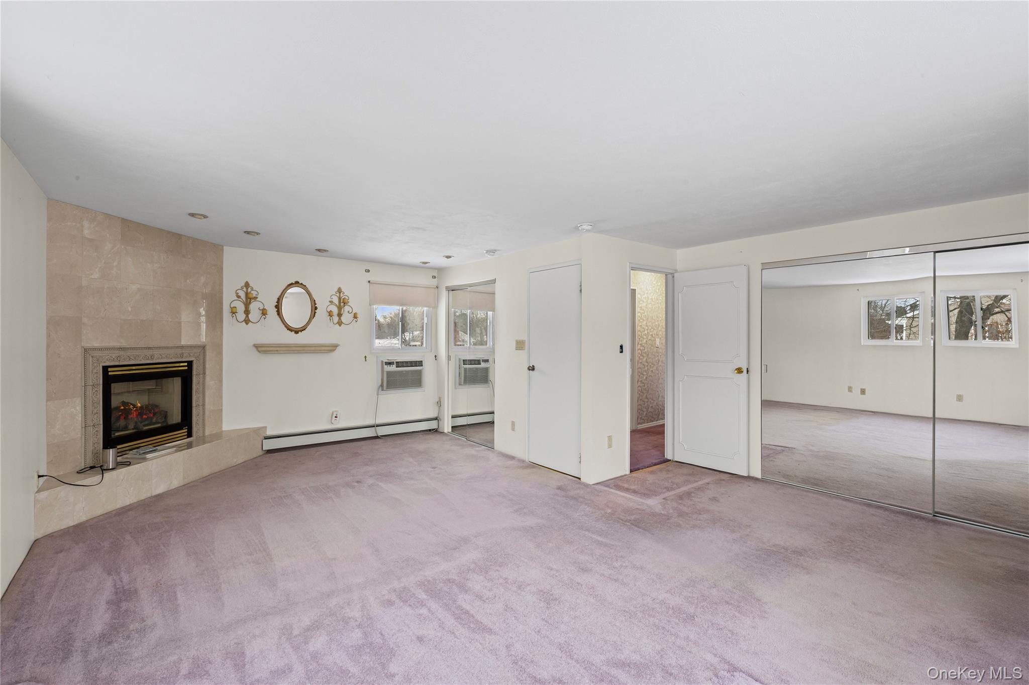 3 Brenner Road Coram, NY 11727 - Photo 24 of 41 a view of an empty room with a fireplace