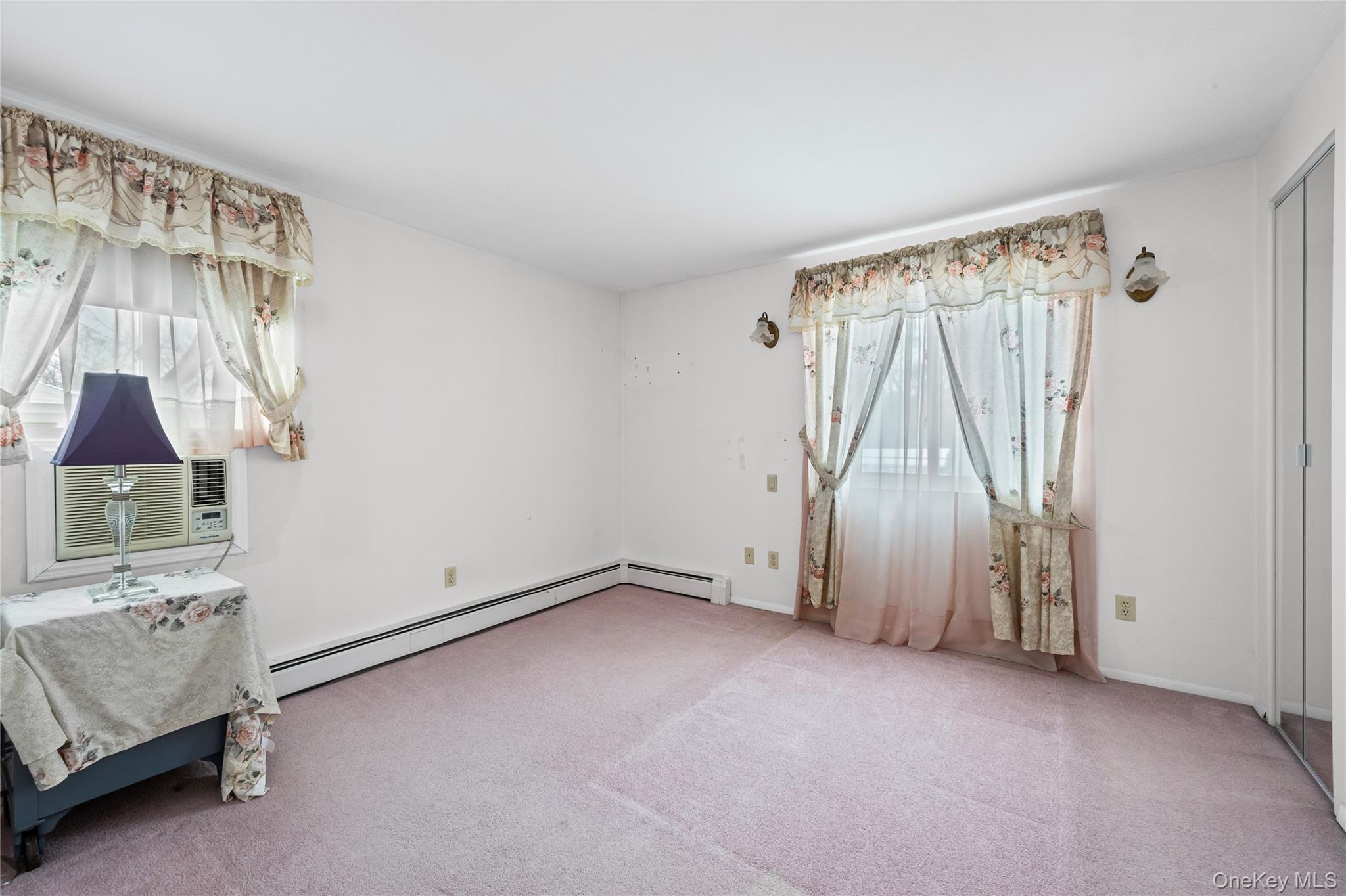 3 Brenner Road Coram, NY 11727 - Photo 29 of 41 a view of an empty room with a fireplace