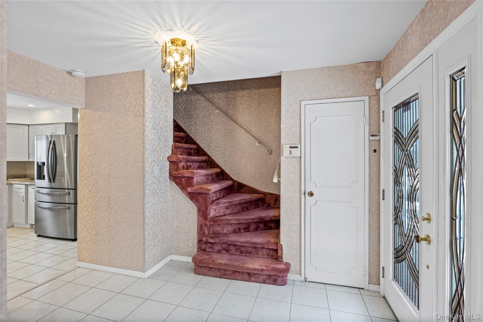 3 Brenner Road Coram, NY 11727 - Photo 7 of 41 a view of entryway and kitchen