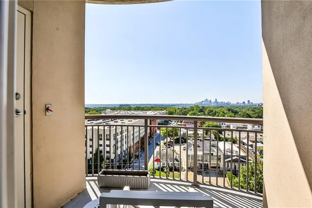a view of balcony with furniture
