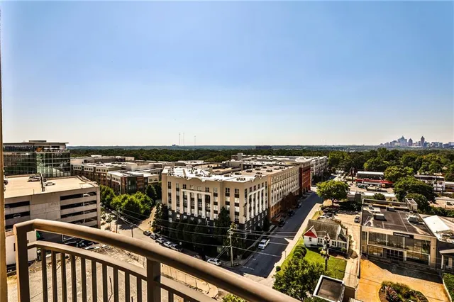 a view of a balcony with city