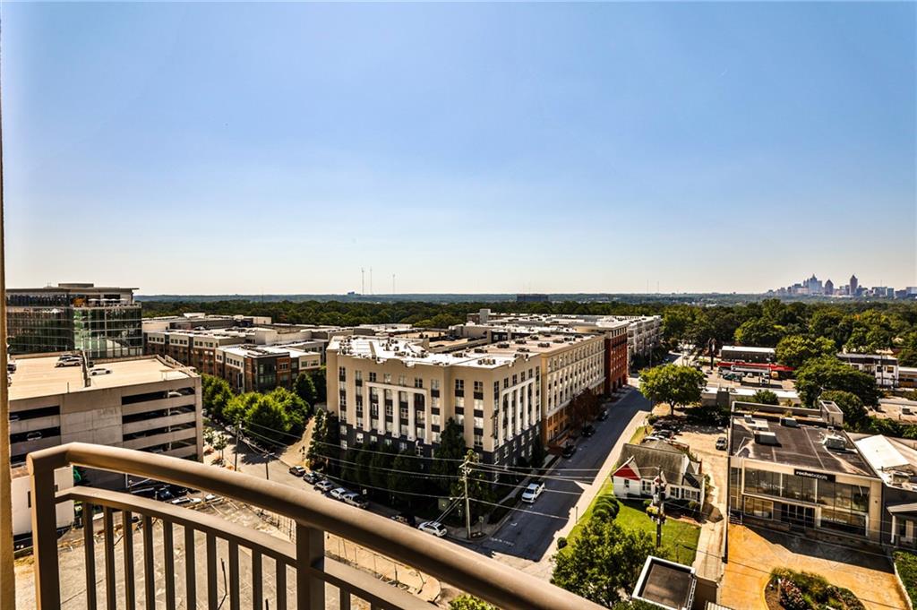 325 East Paces Ferry Road Northeast, Unit 1105 Atlanta, GA 30305 - Photo 22 of 36 a view of a balcony with city