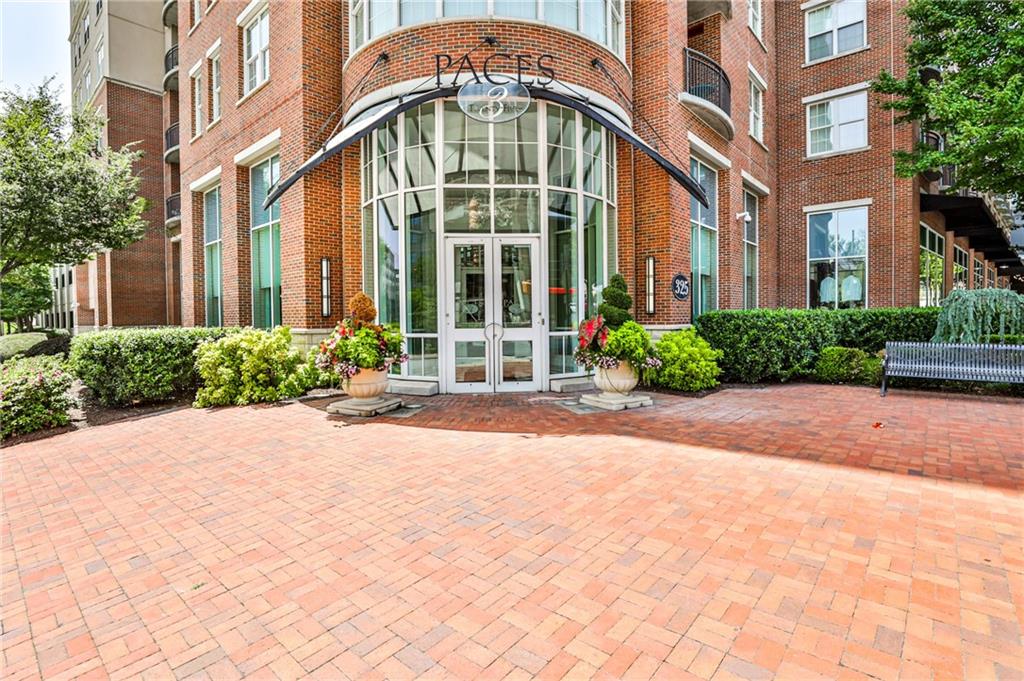 325 East Paces Ferry Road Northeast, Unit 1105 Atlanta, GA 30305 - Photo 24 of 36 a front view of a building