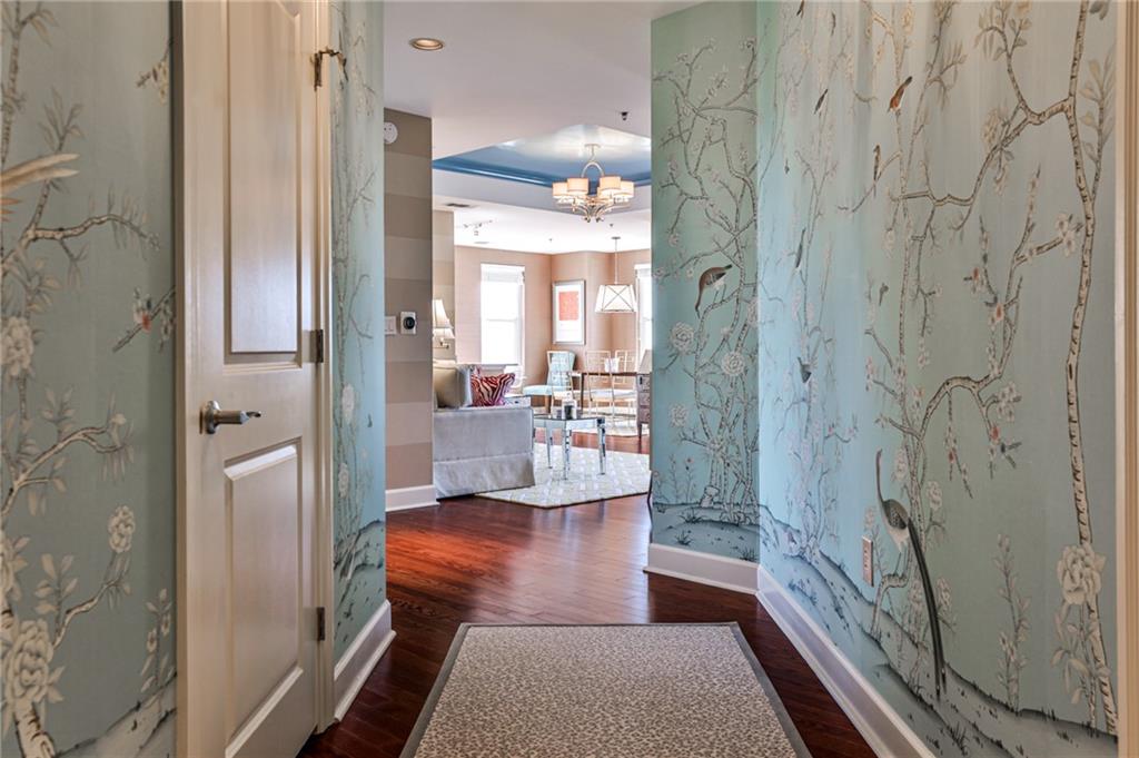 325 East Paces Ferry Road Northeast, Unit 1105 Atlanta, GA 30305 - Photo 3 of 36 a bathroom with a bathtub and shower