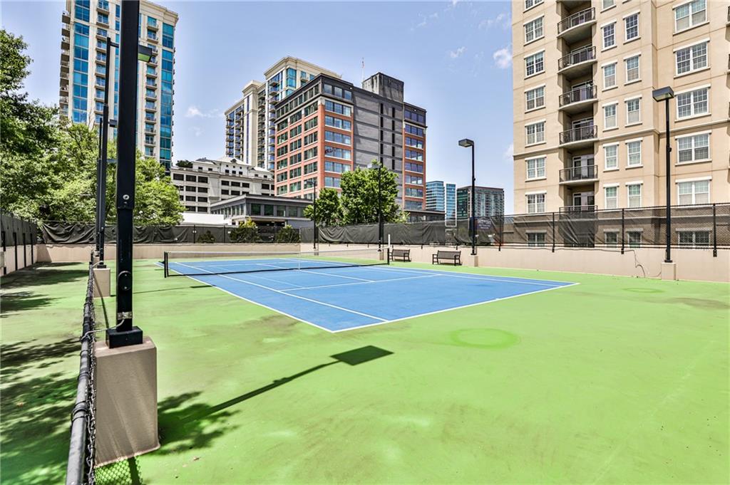 325 East Paces Ferry Road Northeast, Unit 1105 Atlanta, GA 30305 - Photo 31 of 36 a view of a city with tall buildings