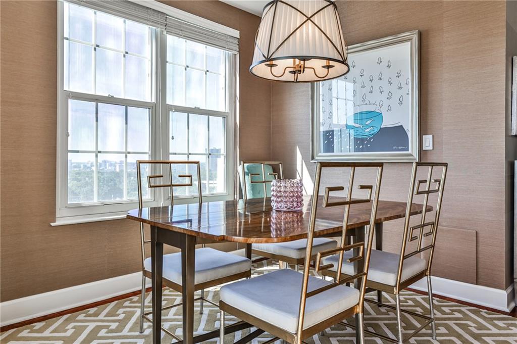 325 East Paces Ferry Road Northeast, Unit 1105 Atlanta, GA 30305 - Photo 10 of 36 a view of a dining room with furniture window and chandelier